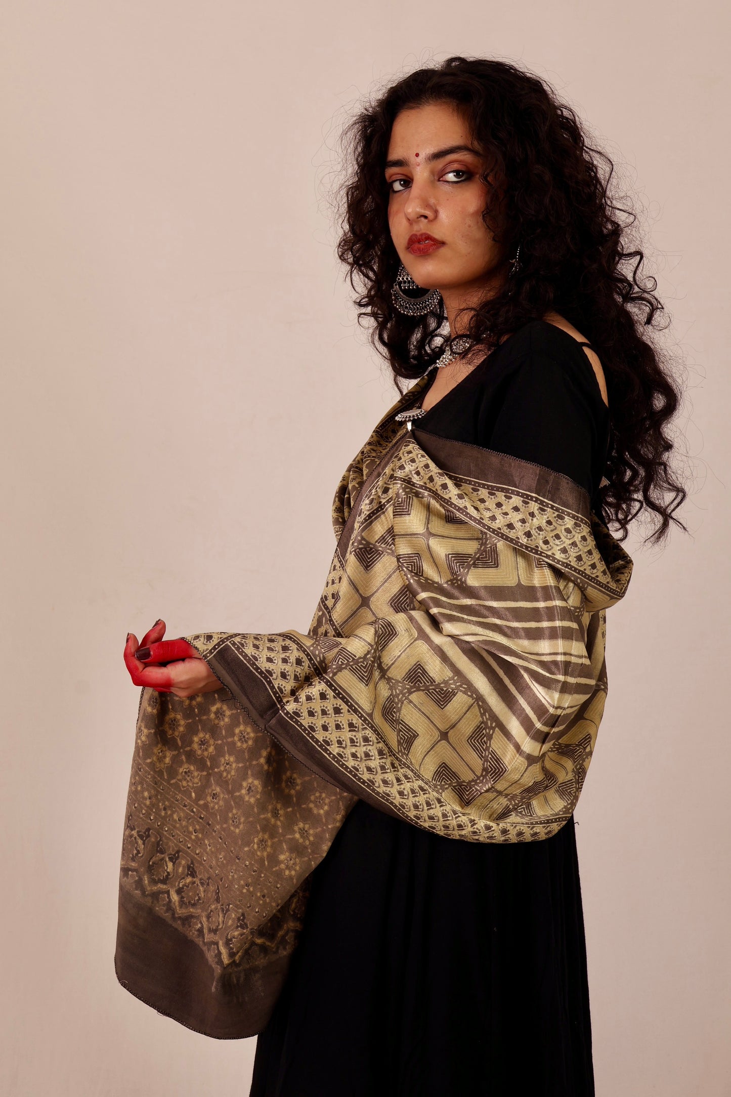Ethnic sand beige Mashru silk stole with detailed Ajrakh patterns and soft texture