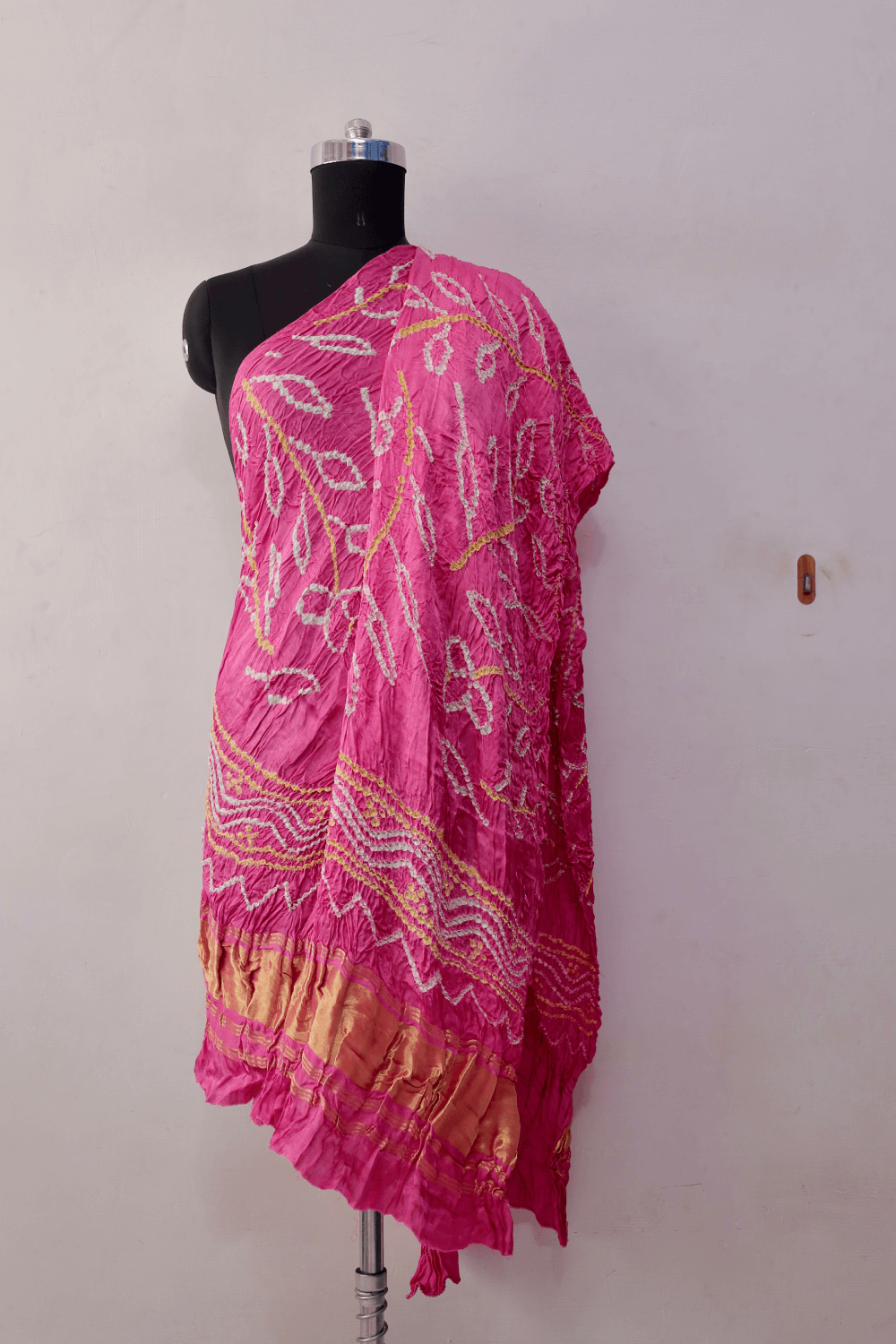 Lightweight bubblegum pink Bandhani modal silk dupatta with elegant texture and graceful flow