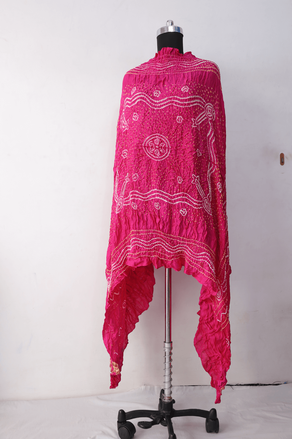 Luxurious candy pink Bandhani dupatta crafted in soft and lustrous Gajji silk
