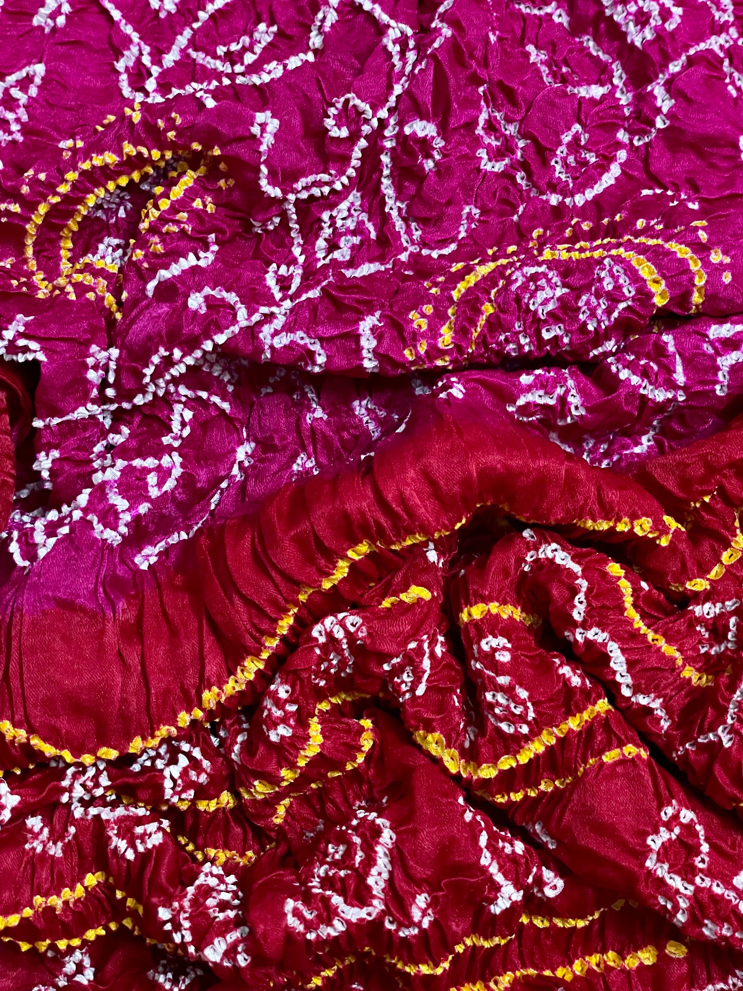 Luxurious cherry red and pink Bandhani dupatta crafted in soft and lustrous Gajji silk