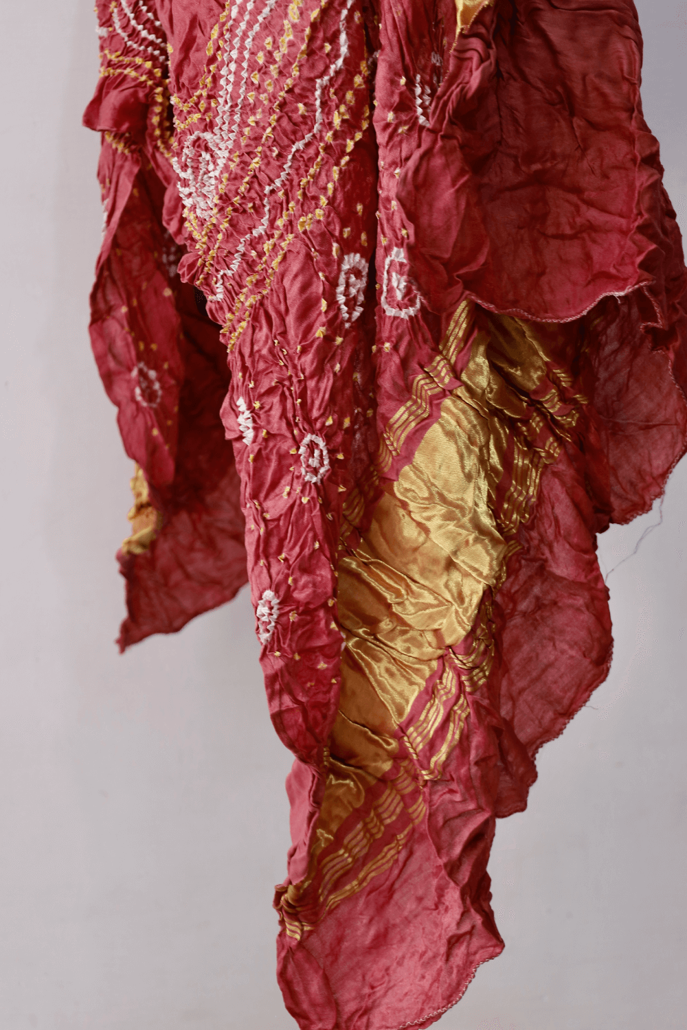 Luxurious dusty rose Bandhani dupatta crafted in soft and lustrous Gajji silk