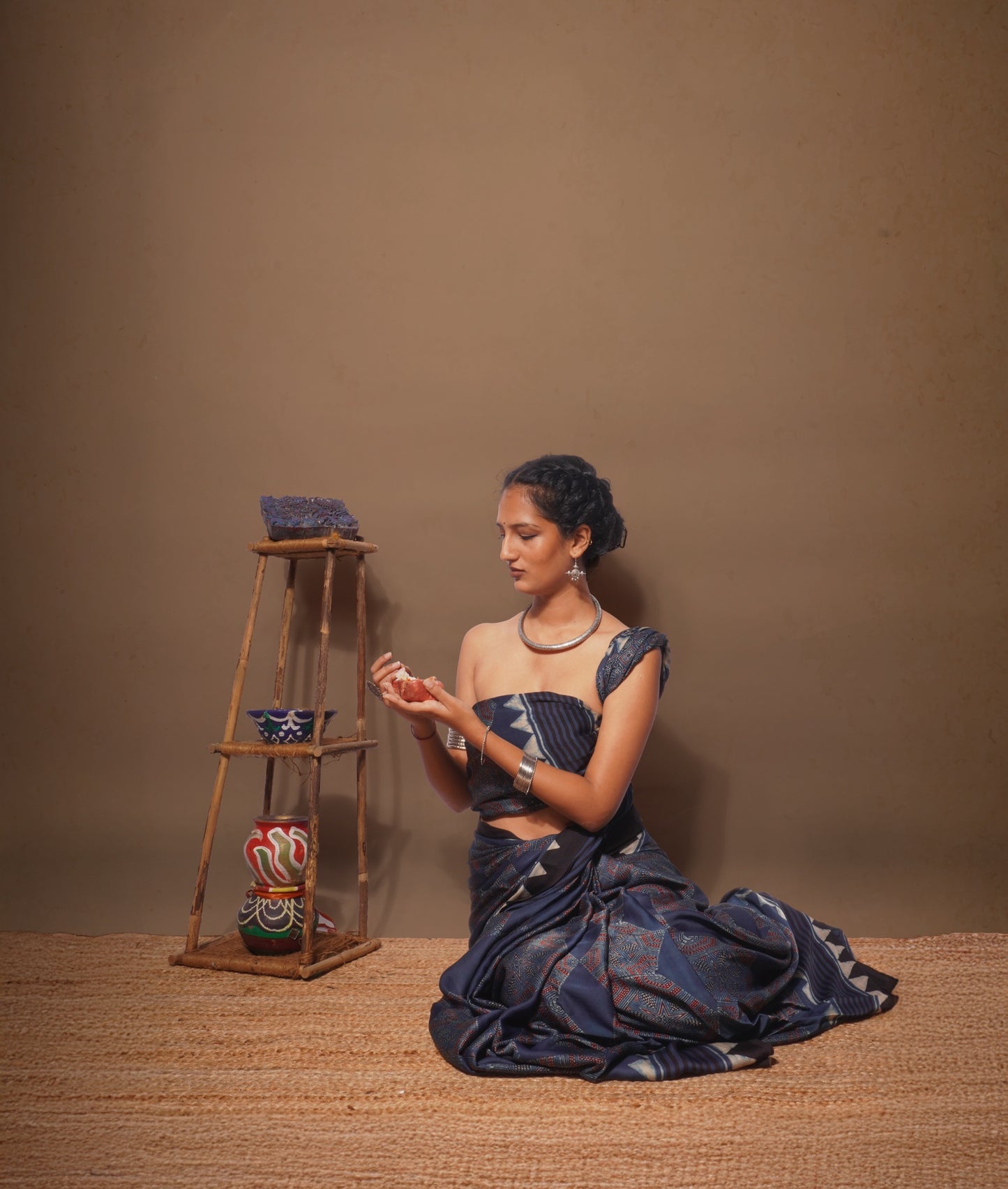 Handcrafted midnight navy modal silk saree adorned with traditional Ajrakh patterns and artisanal detailing