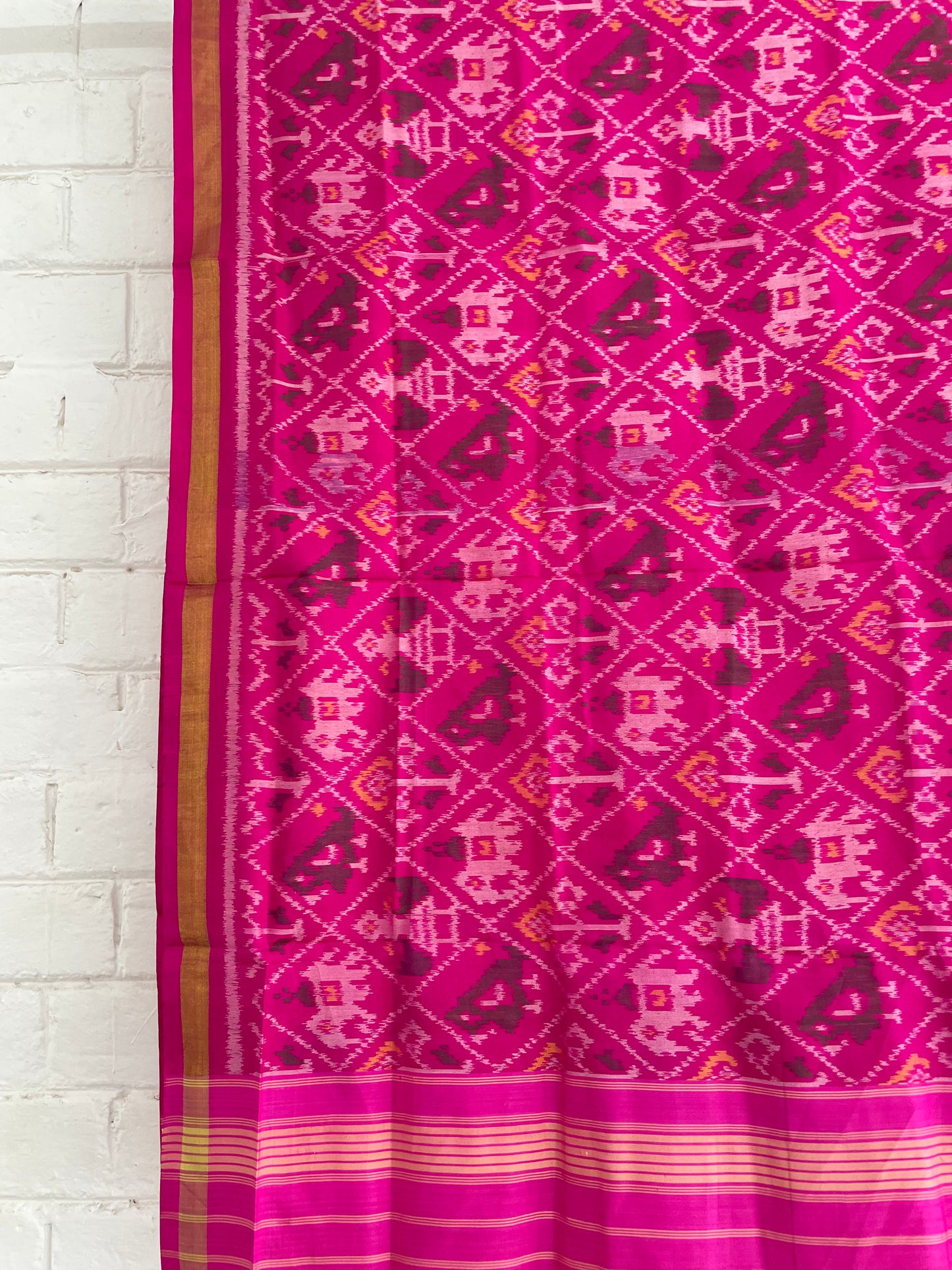 Handcrafted pink Patola dupatta showcasing authentic Single Ikkat weaving artistry