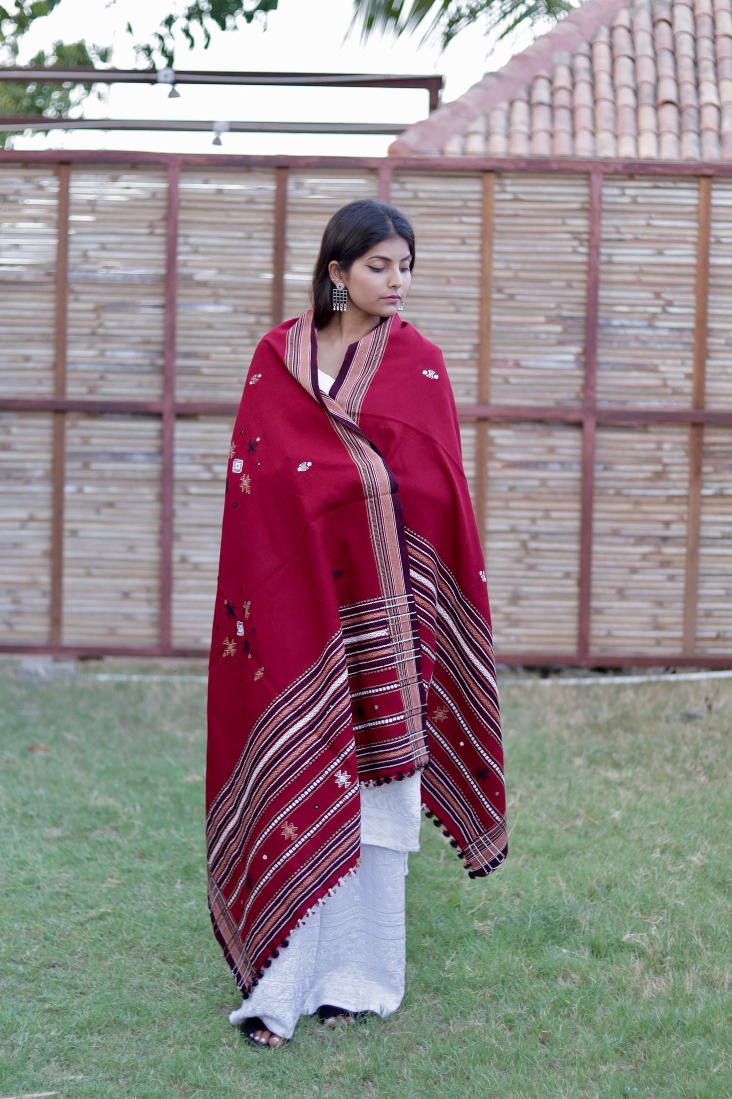 Traditional scarlet red wool shawl showcasing authentic weaving artistry and timeless appeal