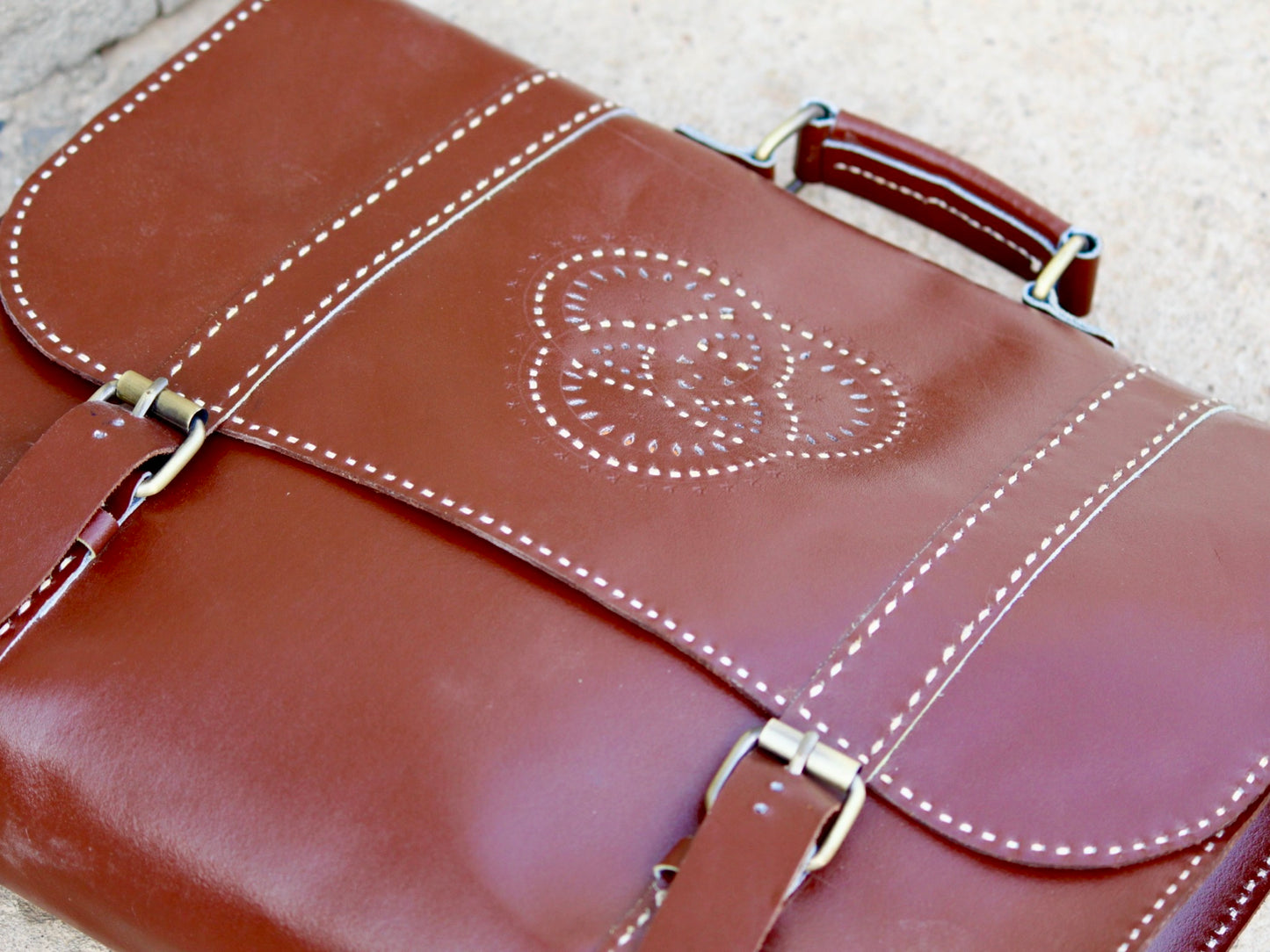Premium leather office bag featuring a spacious interior and elegant finish