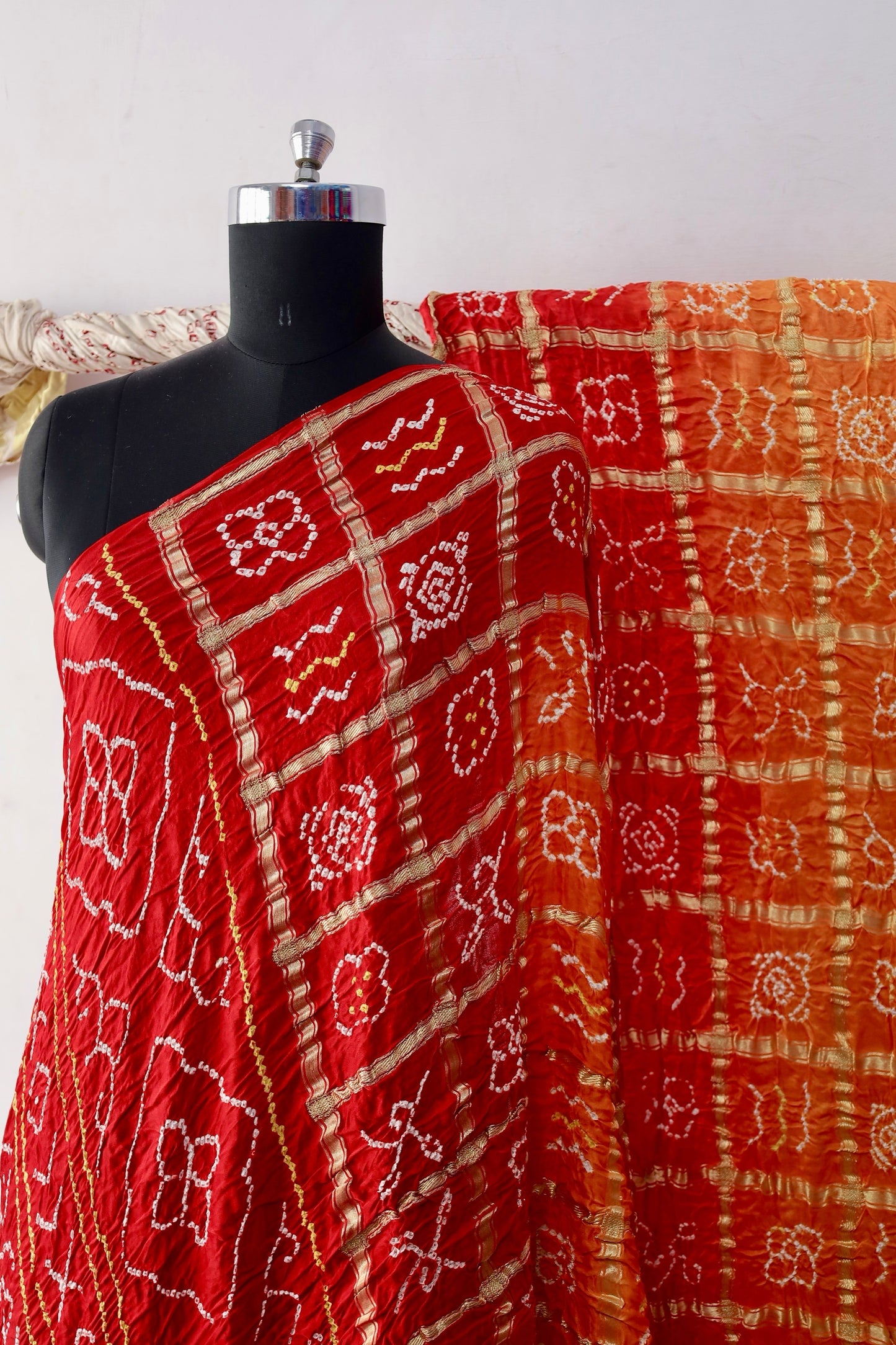 Elegant Gajji silk saree adorned with handcrafted Bandhani patterns and classic Gharchola design