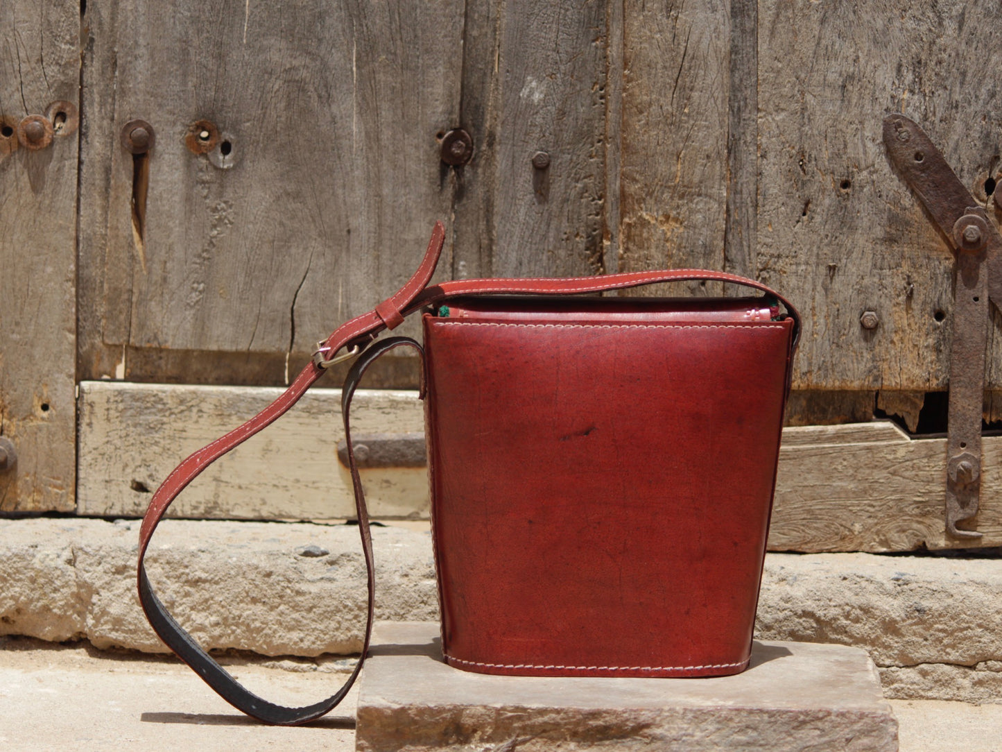Leather bag with thread work