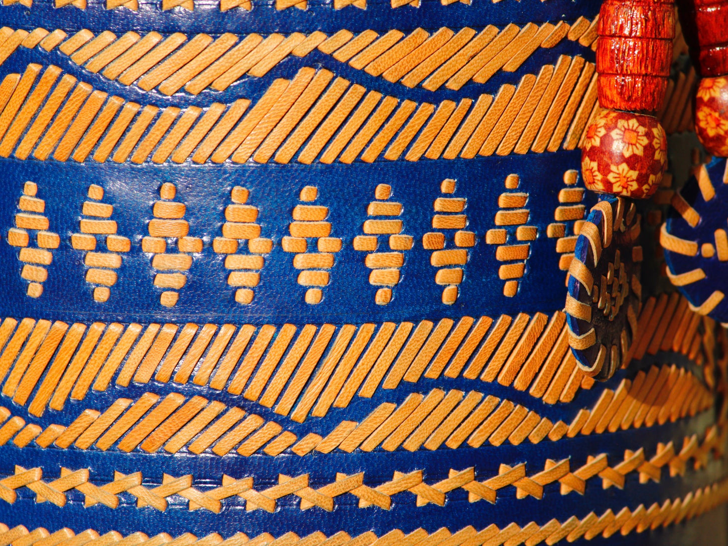 Leather potli bag with thread work