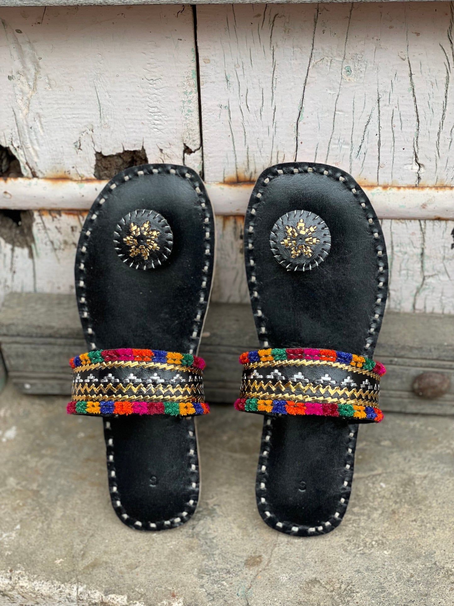 Premium black handcrafted leather flats with fine artisan stitching details