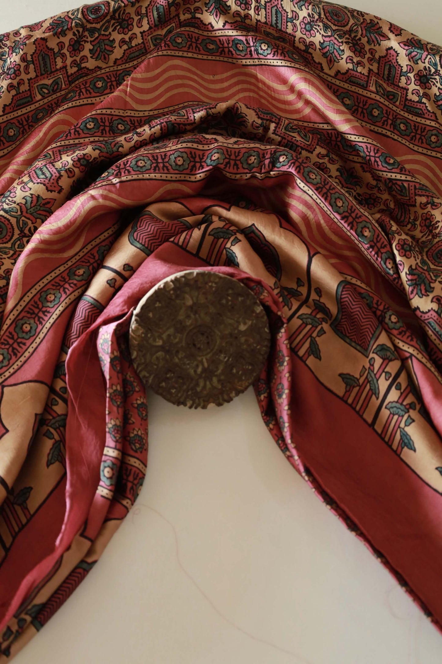 Premium dusty rose flamingo modal silk saree showcasing authentic Ajrakh craftsmanship and timeless motifs