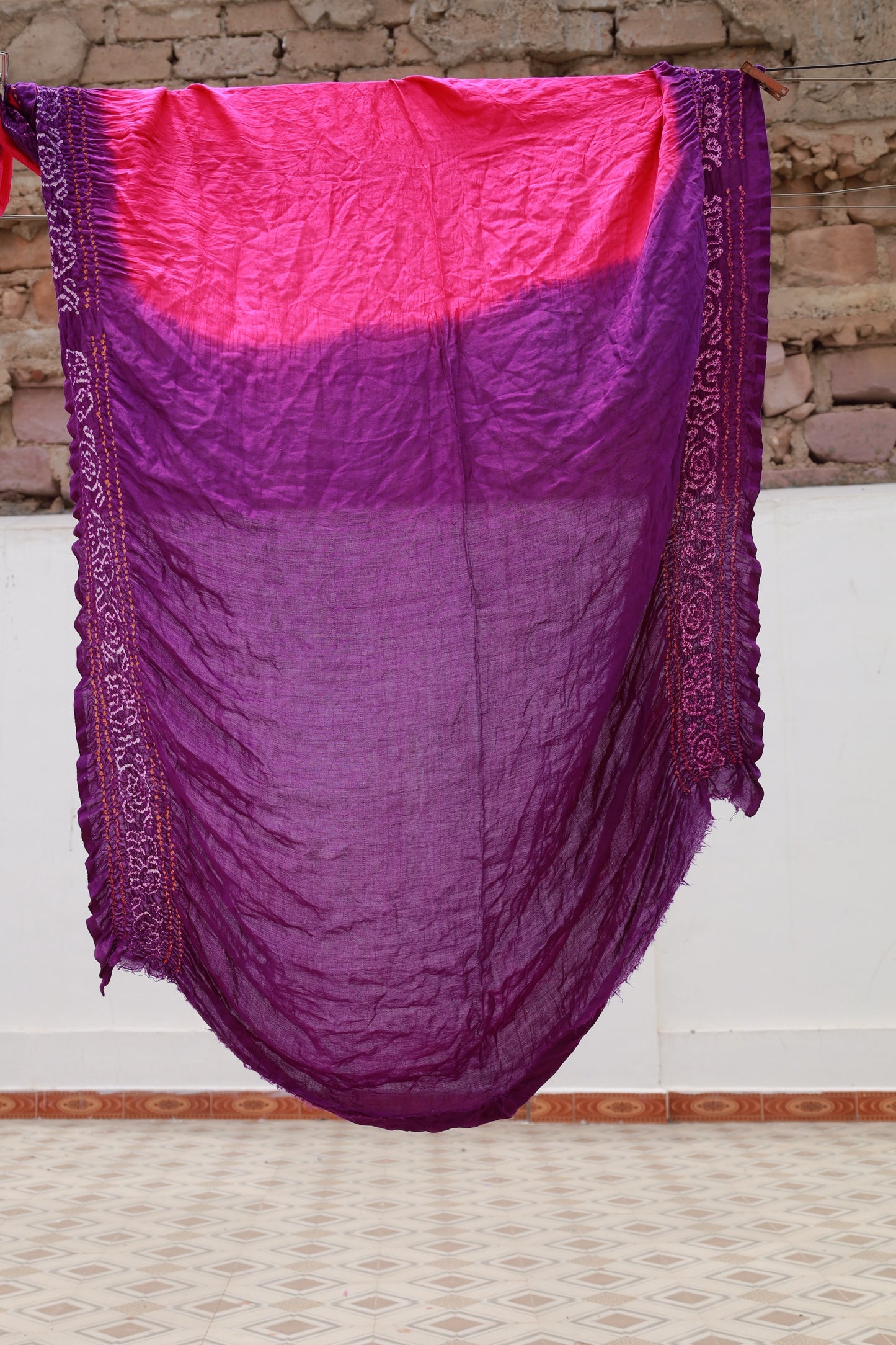 Elegant Gajji silk saree adorned with delicate Bandhani motifs and a luxurious zari pallu