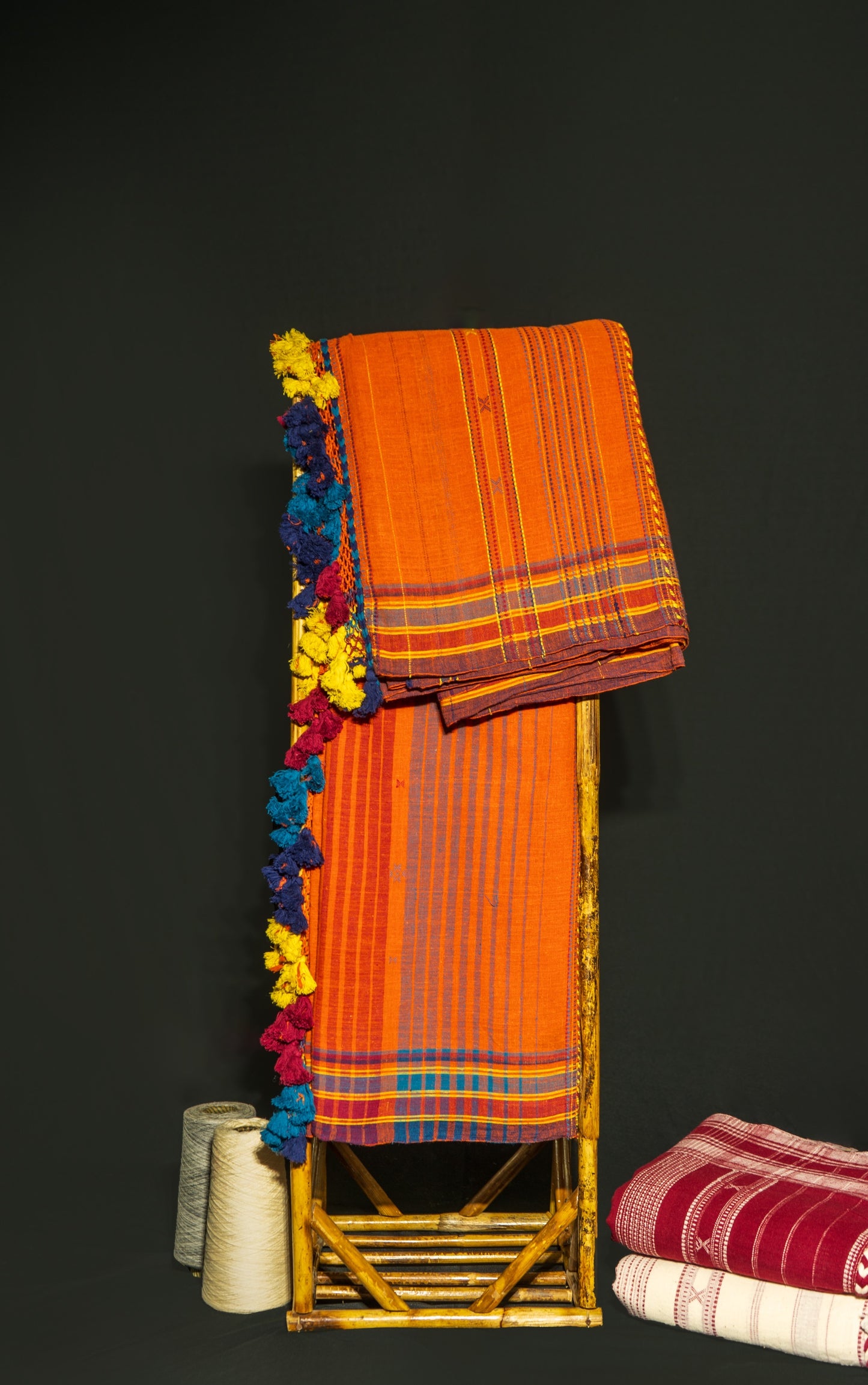 Premium rust Kala Cotton saree showcasing traditional Bhujodi textile artistry and timeless appeal