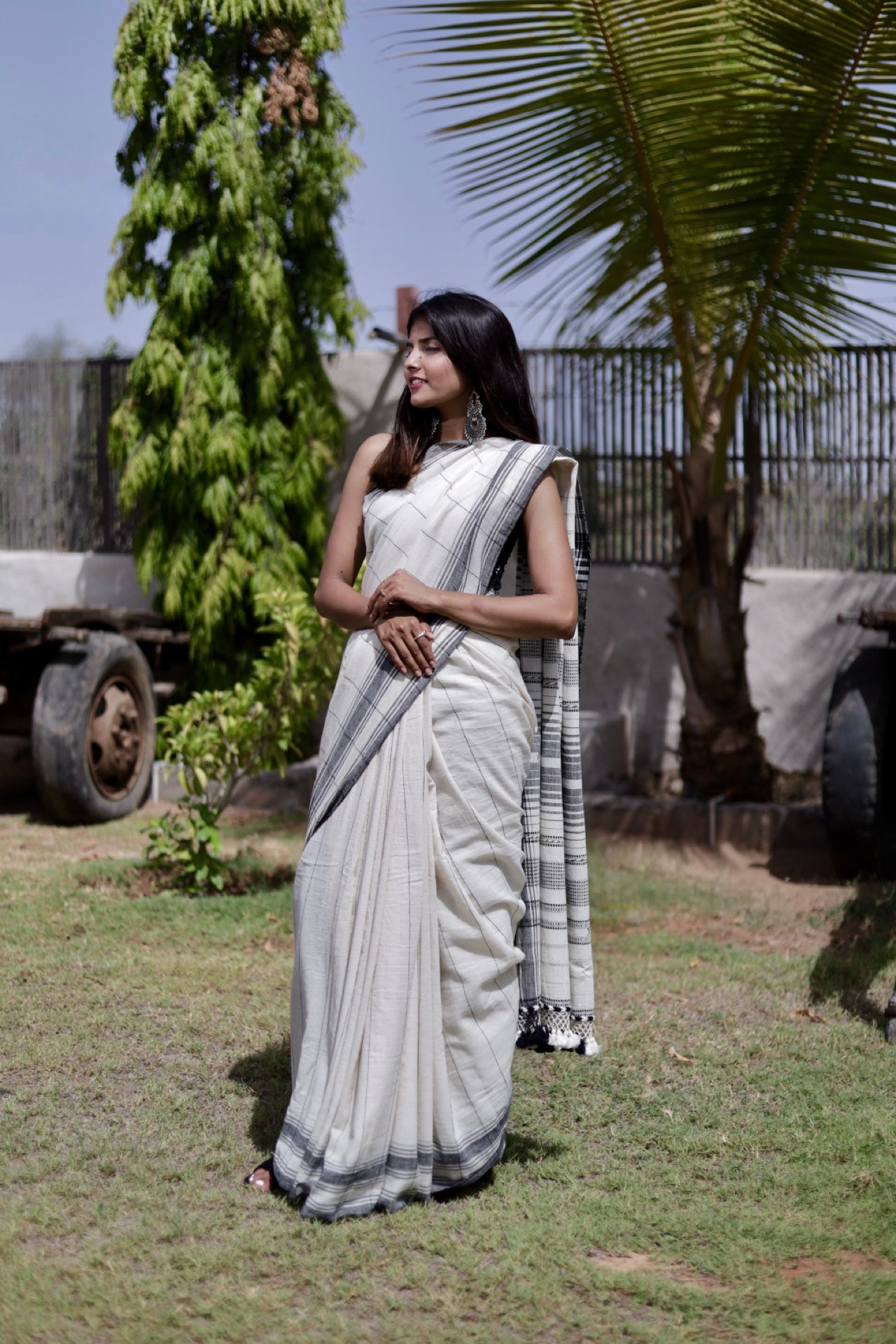 Premium slate Kala Cotton saree showcasing traditional Bhujodi textile artistry and timeless appeal