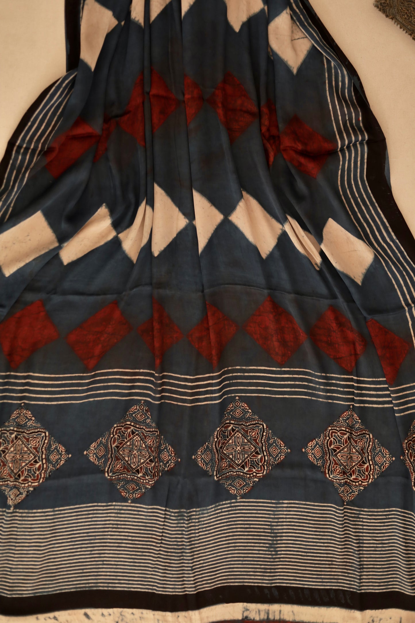 Traditional indigo rust Ajrakh modal silk dupatta showcasing authentic artisan craftsmanship