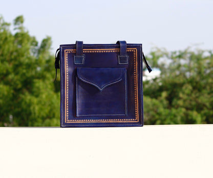 Handstitched leather bag crafted from premium leather with meticulous handmade detailing