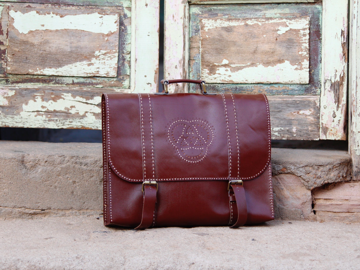 Handmade leather office bag showcasing durable construction and skilled craftsmanship