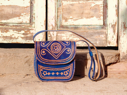 Elegant leather bag with embroidered accents and durable leather construction