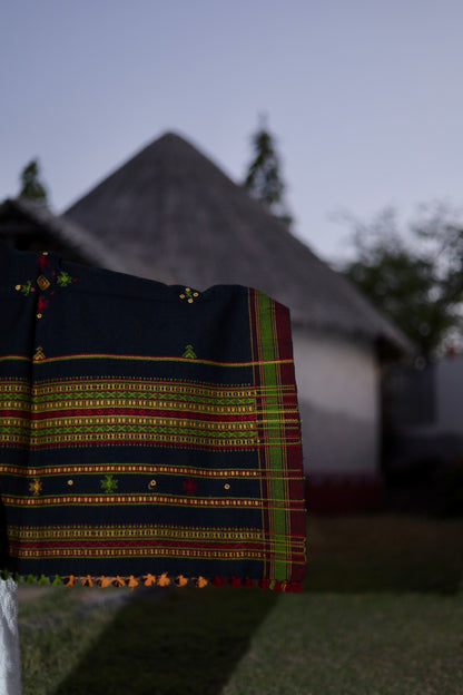 Elegant black wool shawl handcrafted using traditional handloom weaving techniques