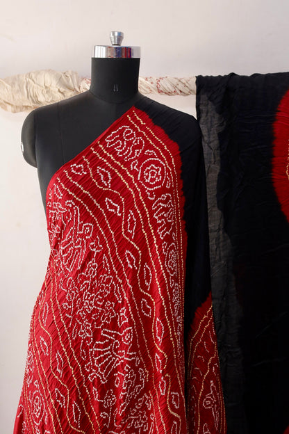 Handcrafted Crimson Edge Gajji silk saree showcasing authentic Bandhani artistry with rich zari detailing