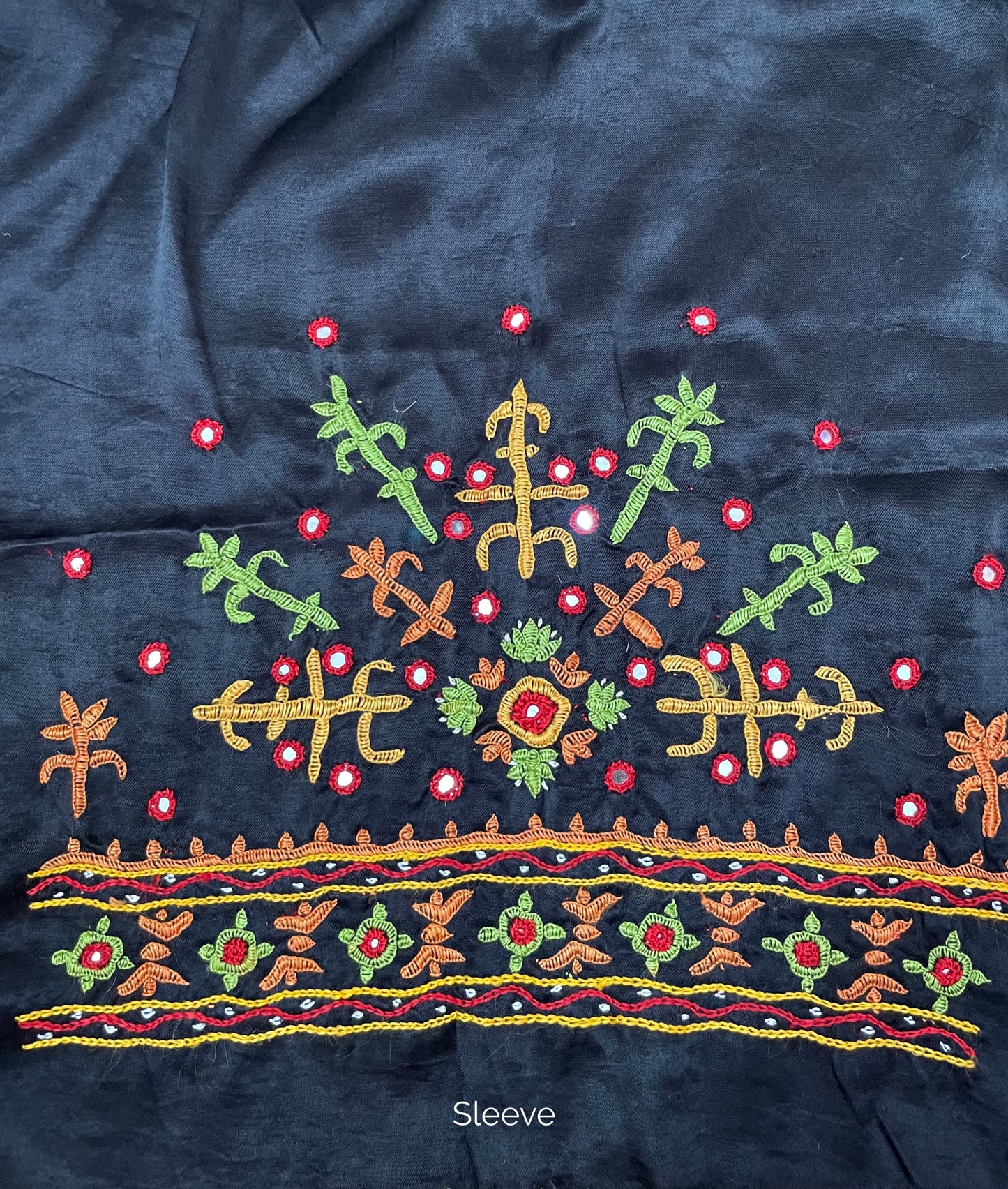 Traditional deep navy blouse piece featuring authentic Pakko embroidery craftsmanship