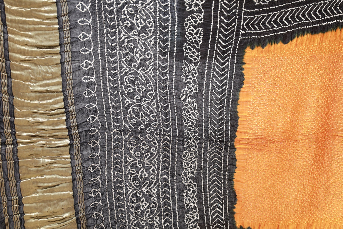 Ember Rai Bandhani silk saree featuring intricate tie-dye patterns and an elegant zari pallu