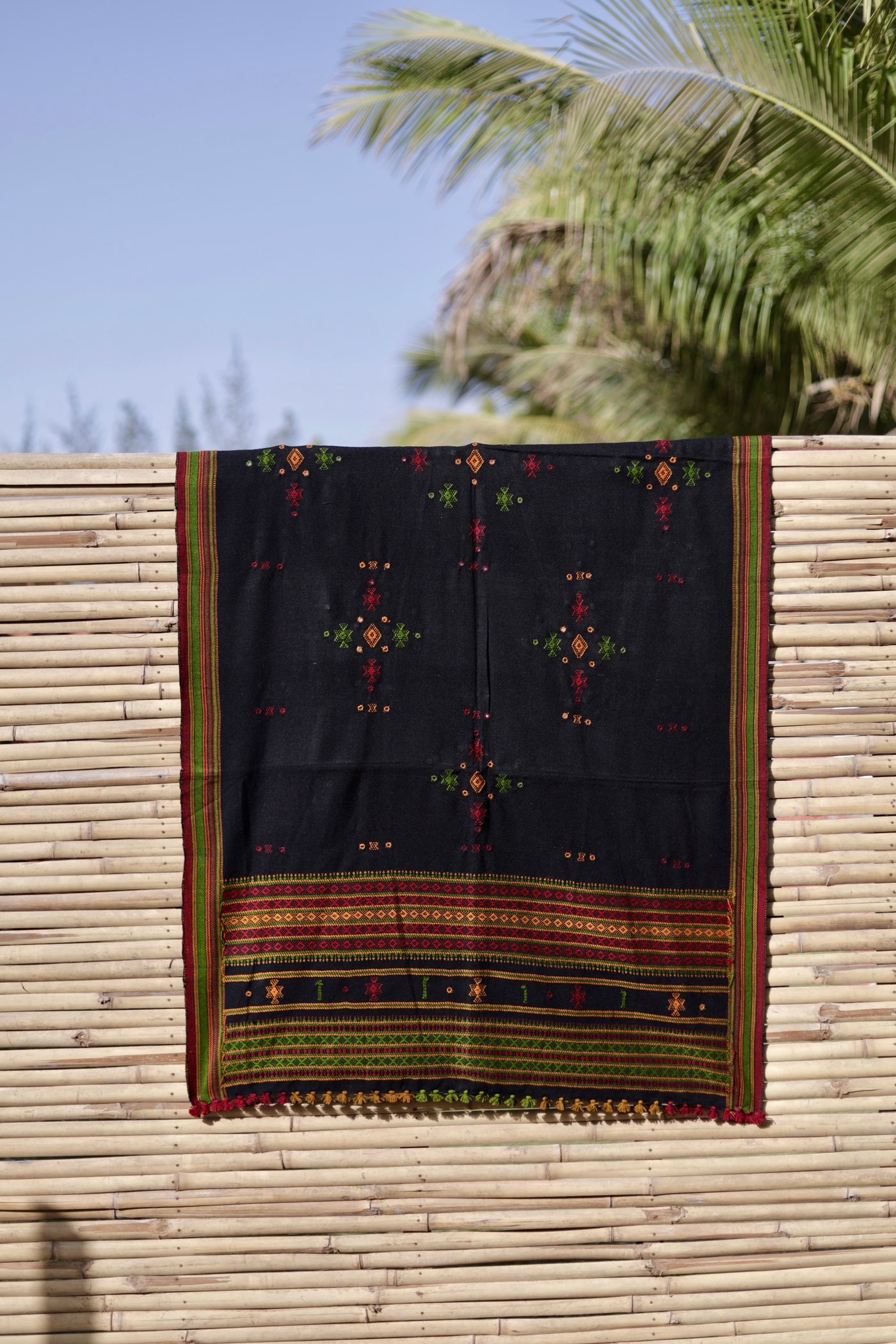 Elegant forest black wool shawl handcrafted using traditional handloom weaving techniques