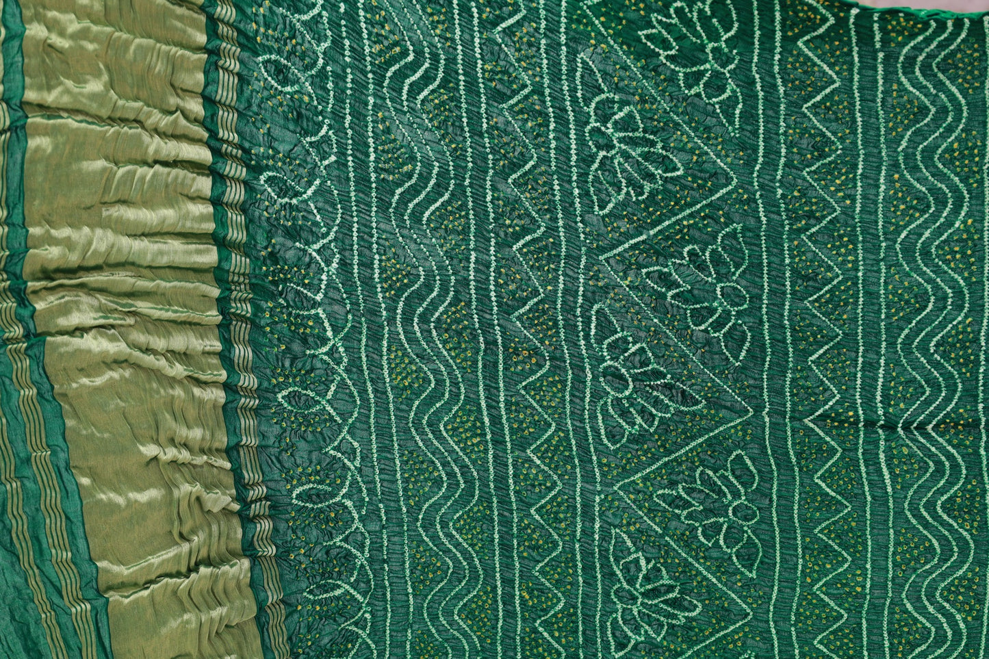 Forest Rai Bandhani silk saree featuring intricate tie-dye patterns and an elegant zari pallu