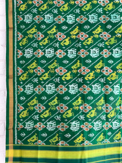 Green Patola Single Ikkat dupatta featuring intricate woven motifs and traditional artisan craftsmanship