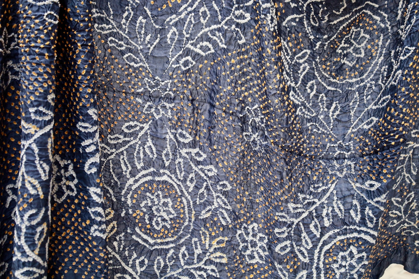 Indigo Rai Bandhani silk saree featuring intricate tie-dye patterns and an elegant zari pallu