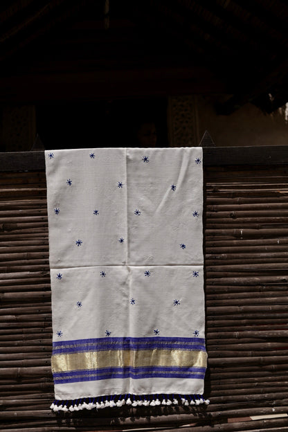 Elegant moonstone white wool stole handcrafted using traditional handloom weaving techniques
