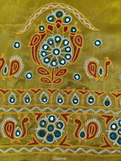 Mustard yellow Ahir embroidery blouse piece showcasing intricate handcrafted embroidery details