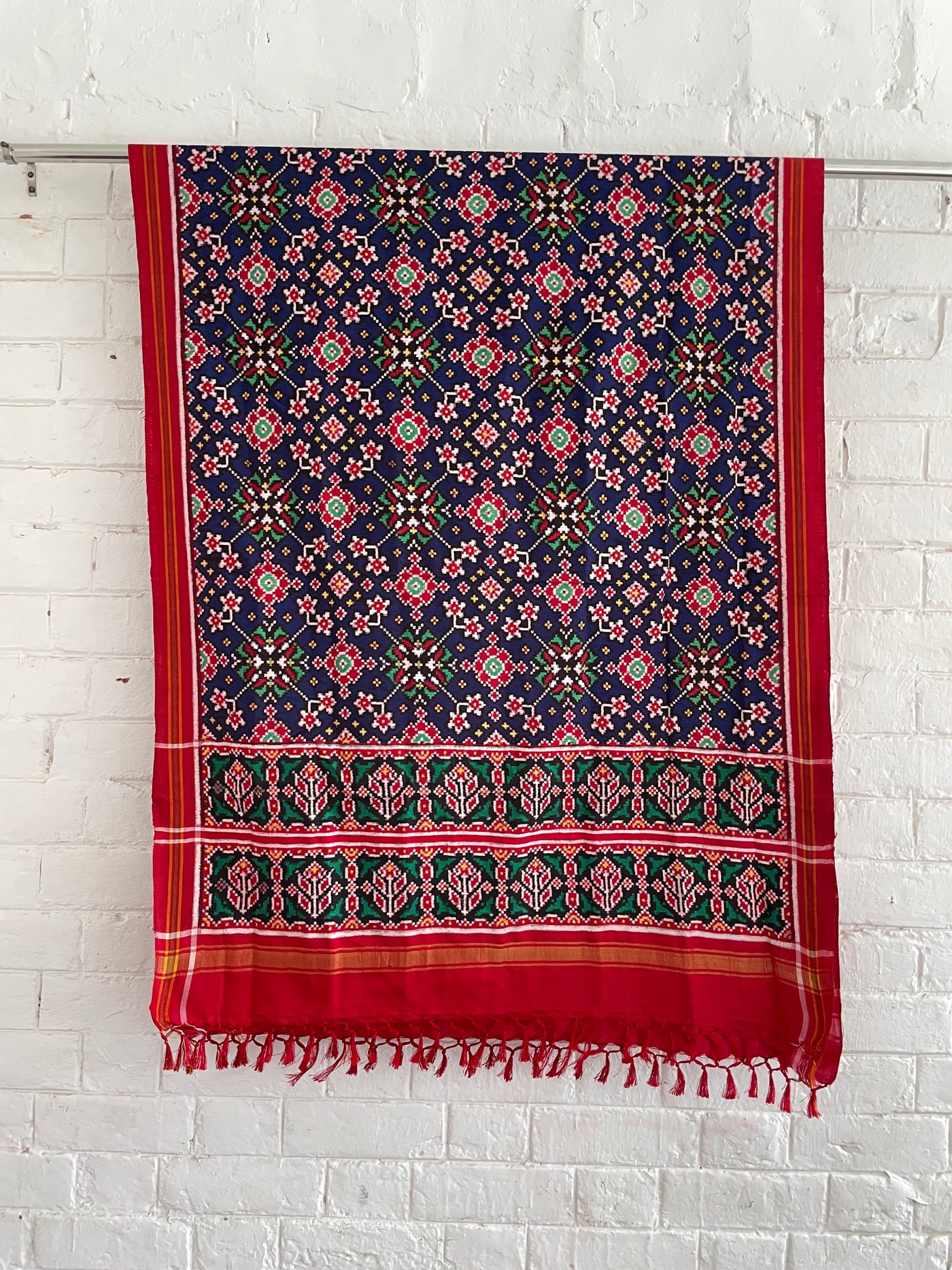 Patola Double Ikat silk dupatta featuring intricate geometric patterns and traditional handwoven craftsmanship
