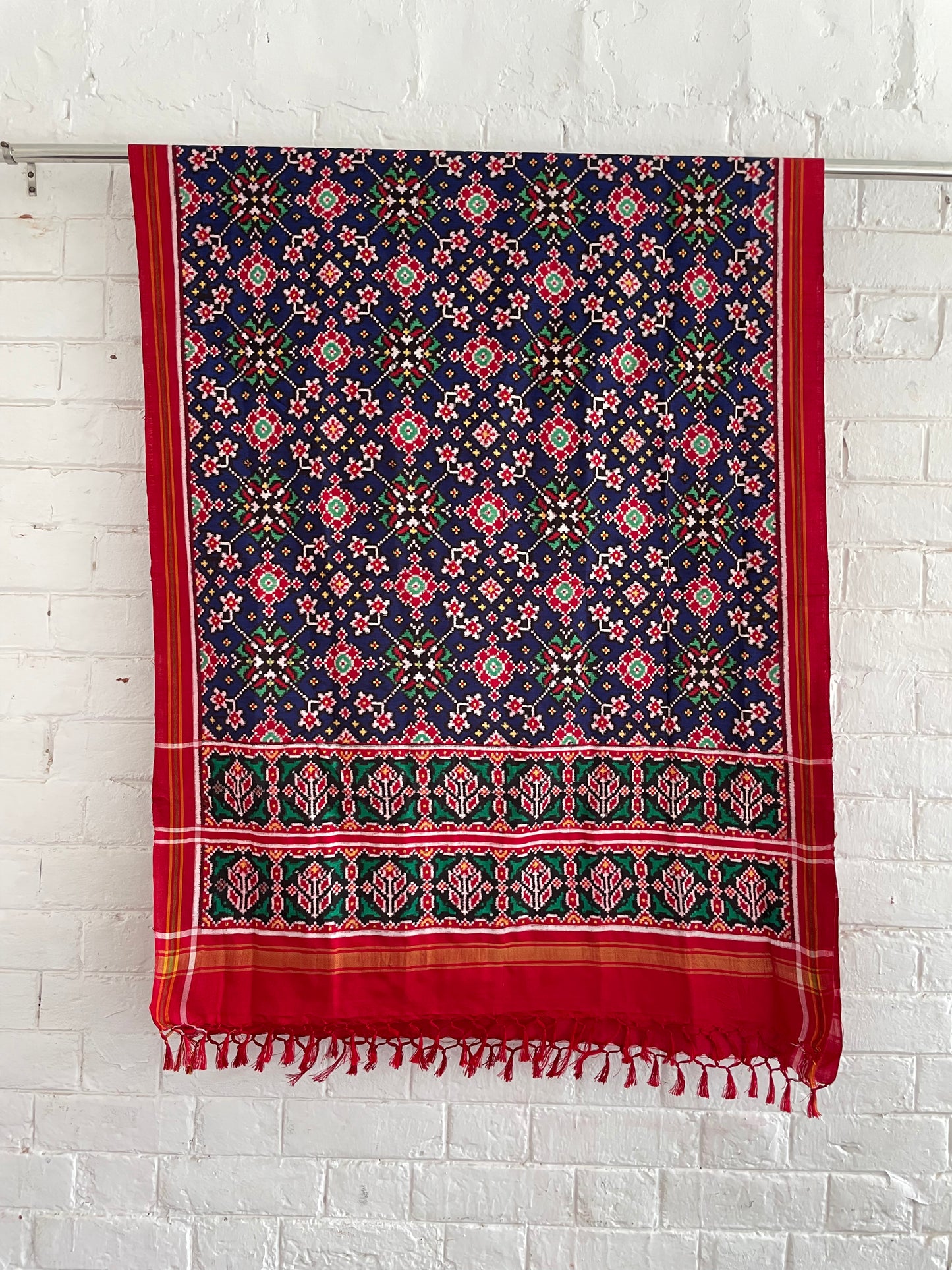 Patola Double Ikat silk dupatta featuring intricate geometric patterns and traditional handwoven craftsmanship