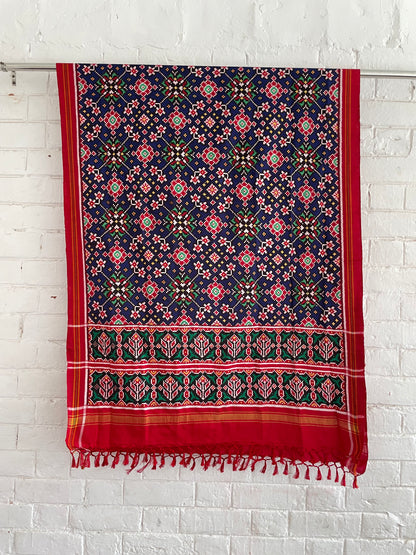 Patola Double Ikat silk dupatta featuring intricate geometric patterns and traditional handwoven craftsmanship
