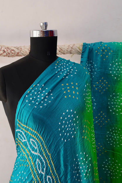 Peacock Bandhani Gajji silk saree featuring intricate tie-dye patterns and an elegant zari pallu