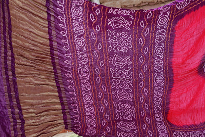 Purple Bandhani Gajji silk saree featuring intricate tie-dye patterns and an elegant zari pallu