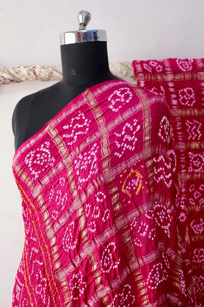 Rosewood Bandhani Gharchola Gajji silk saree featuring traditional tie-dye motifs and heritage-inspired checked patterns
