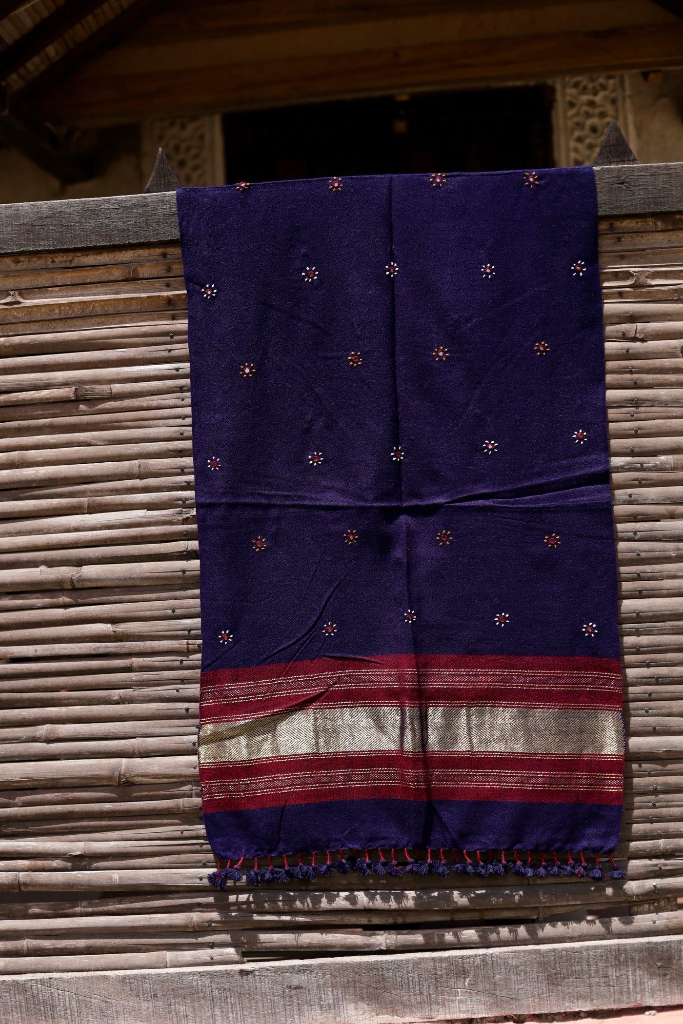Elegant royal indigo wool stole handcrafted using traditional handloom weaving techniques