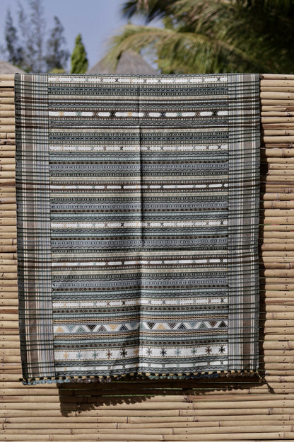 Elegant smoky white wool shawl handcrafted using traditional handloom weaving techniques