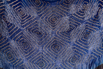 Teal Ajrakh Bandhani silk saree featuring intricate block-printed motifs and traditional tie-dye patterns