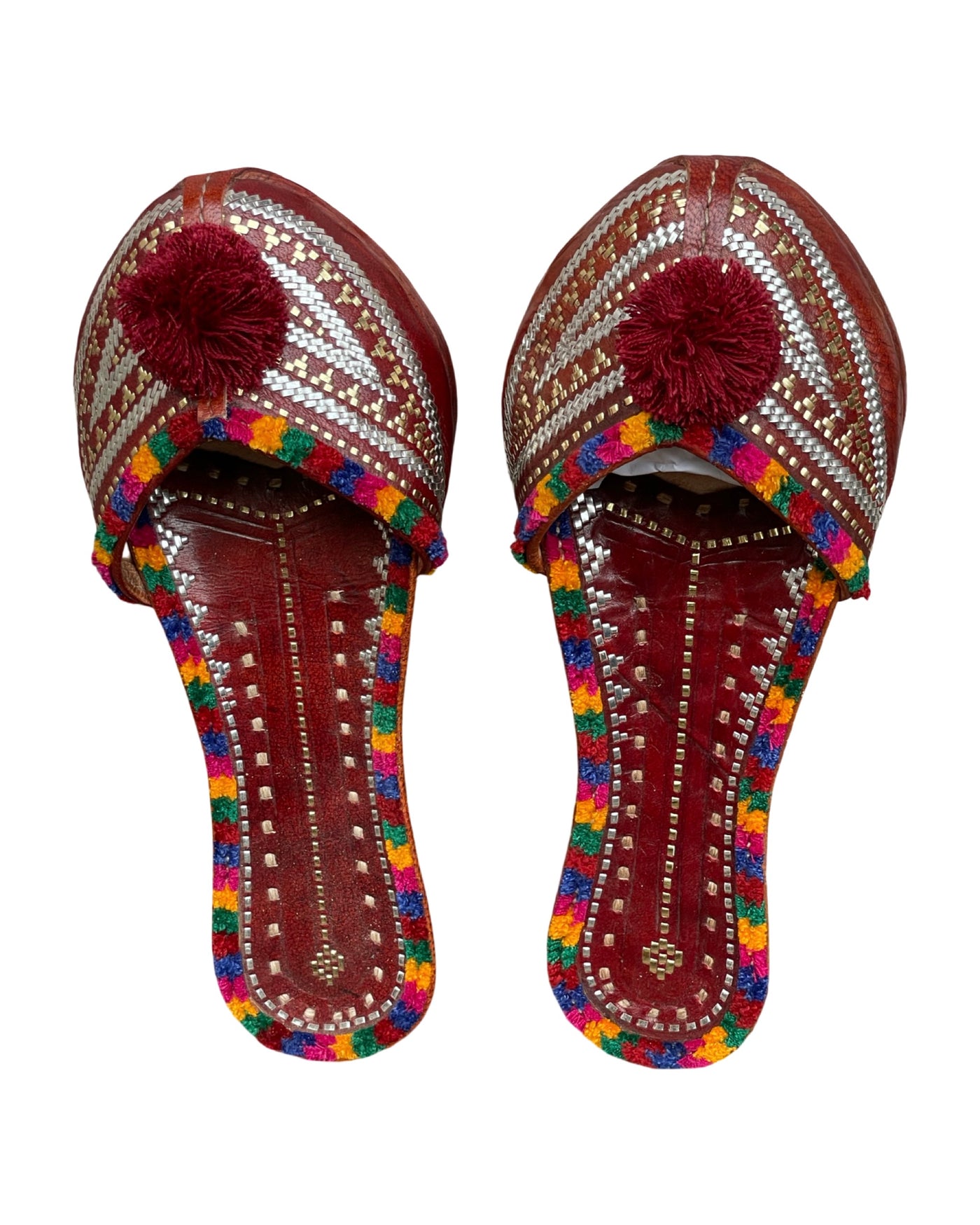 Wedding handstitched leather jutti showcasing traditional craftsmanship and elegant design