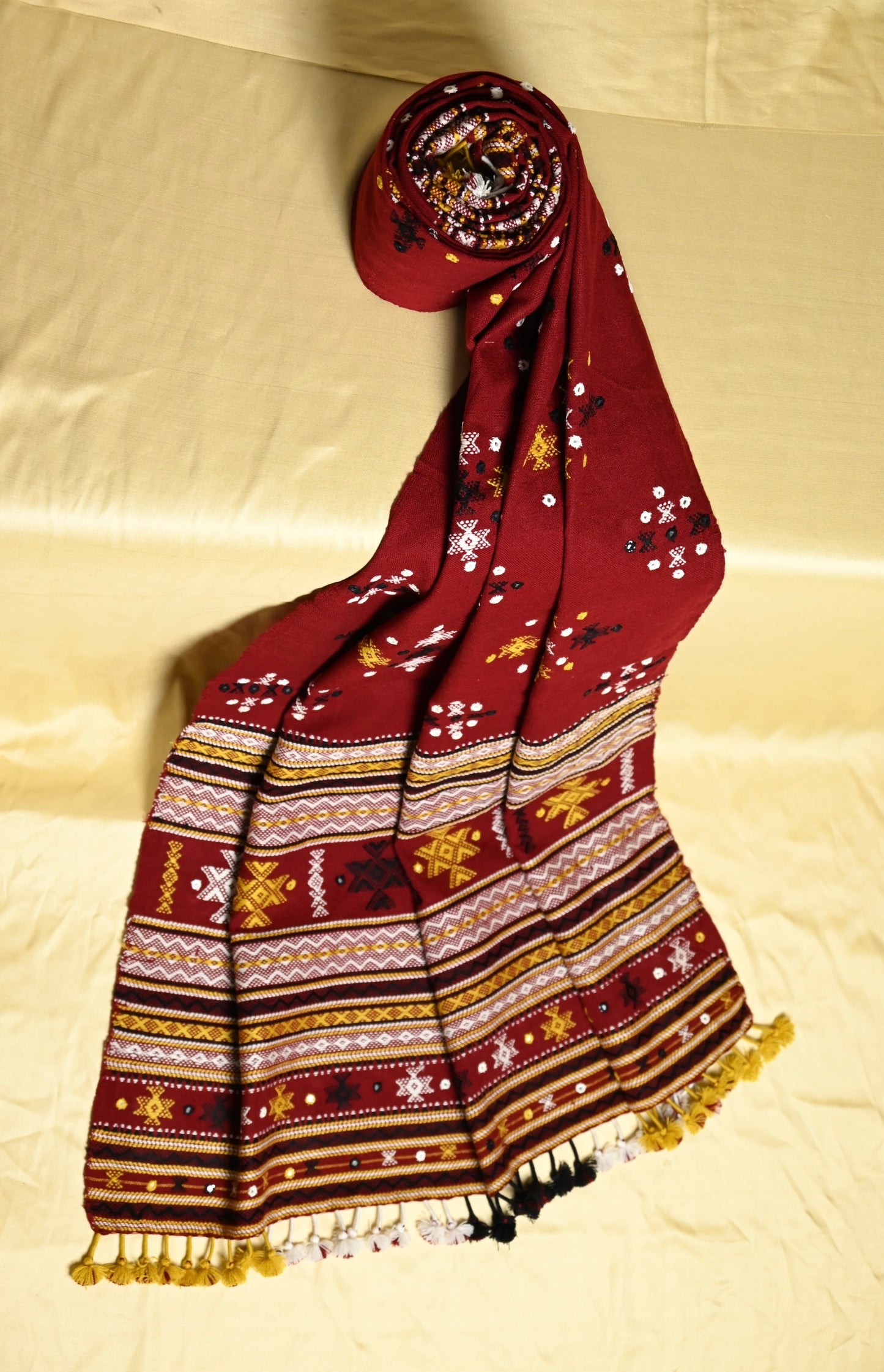 Elegant wine berry wool shawl handcrafted using traditional handloom weaving techniques