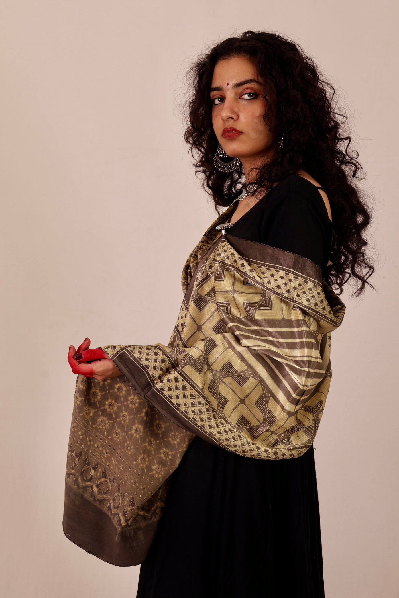 Ethnic sand beige Mashru silk stole with detailed Ajrakh patterns and soft texture
