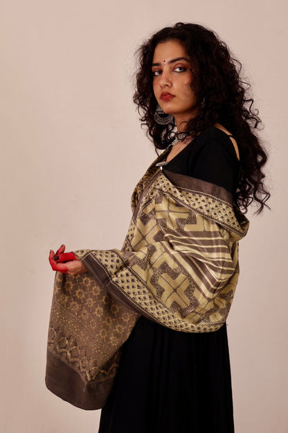 Ethnic sand beige Mashru silk stole with detailed Ajrakh patterns and soft texture