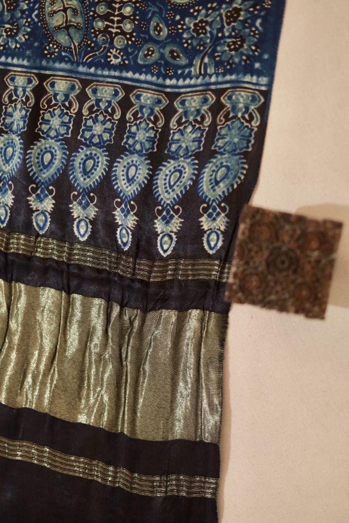 Traditional sapphire blue Ajrakh modal silk dupatta showcasing authentic artisan craftsmanship and decorative borders