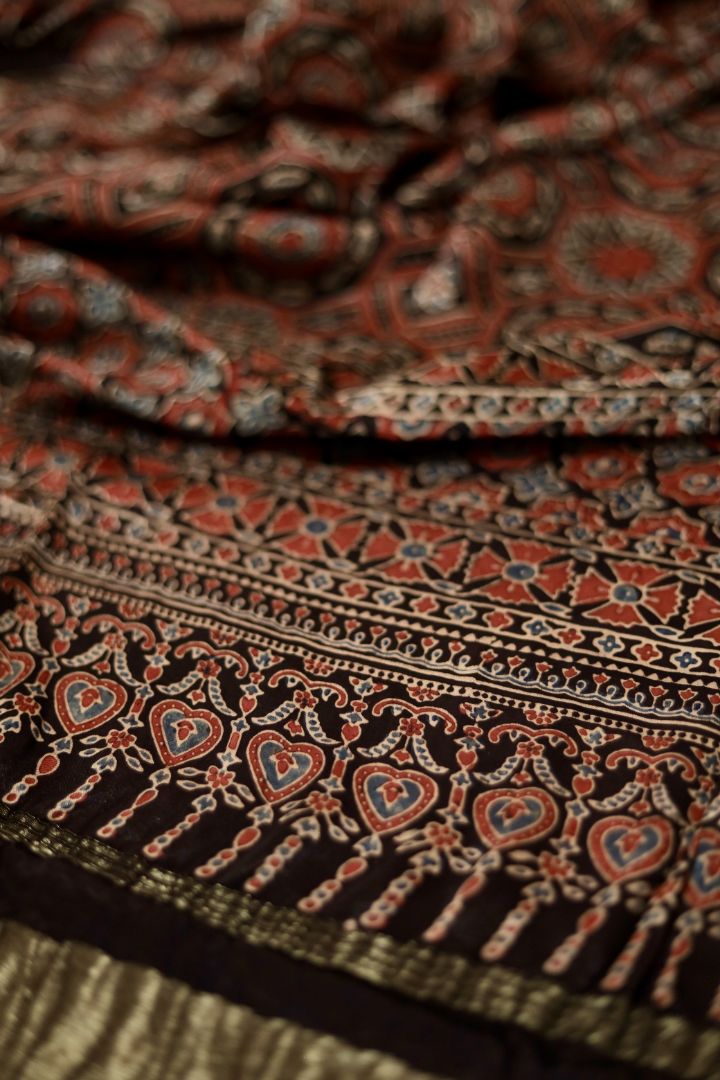 Handcrafted walnut brown Ajrakh dupatta made from premium modal silk with traditional Lagdi Patta detailing