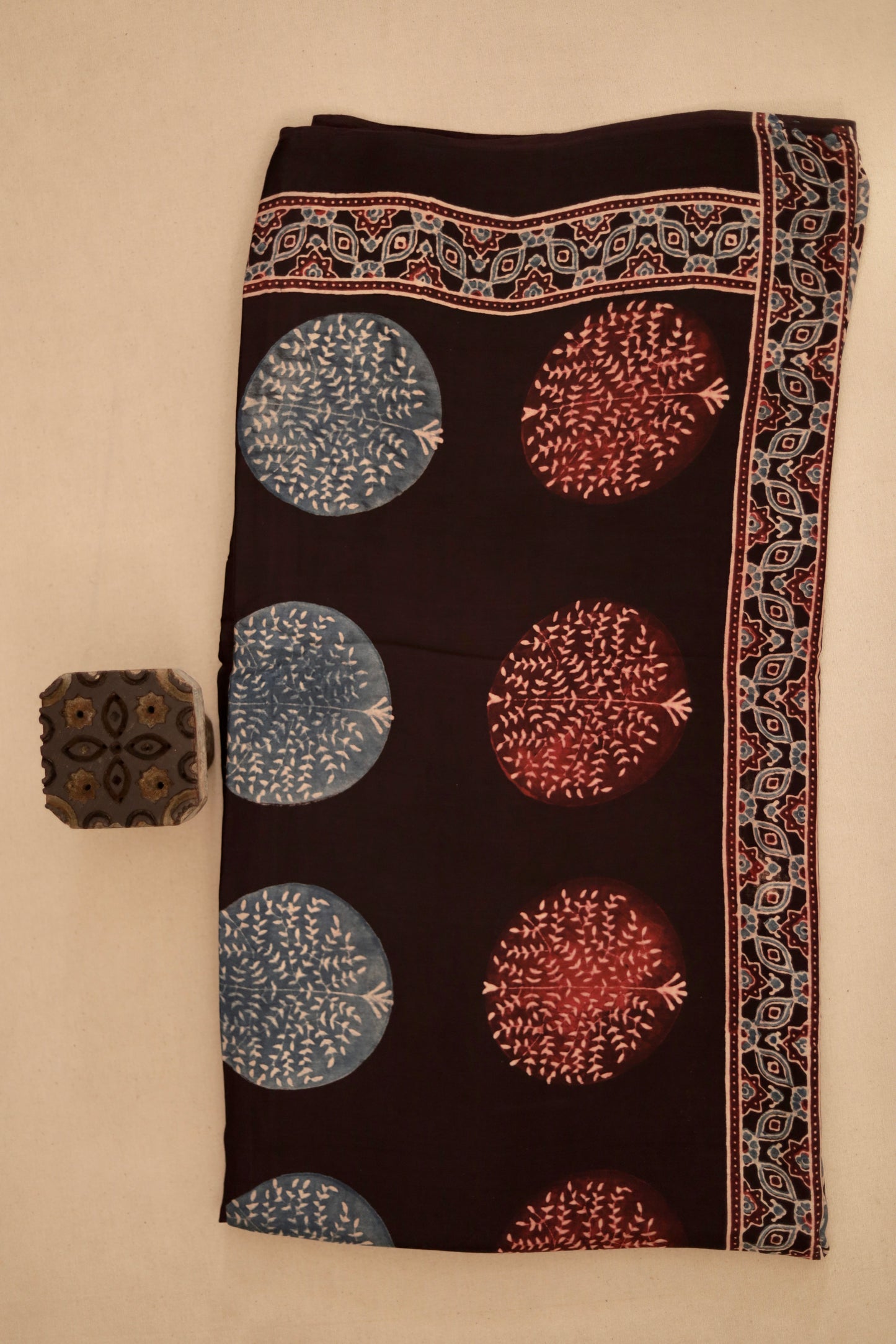 Black Ajrakh modal silk dupatta featuring intricate hand block printed motifs and elegant drape