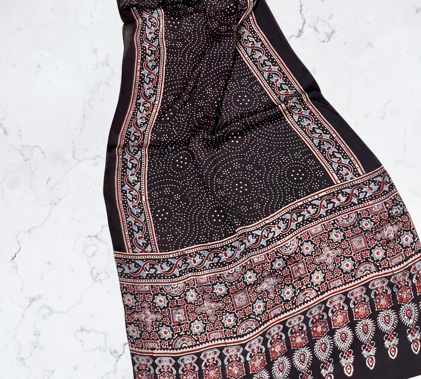 Black Ajrakh modal silk stole featuring intricate hand block printed motifs and elegant drape