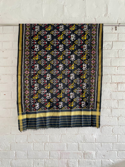 Black Patola Single Ikkat dupatta featuring intricate woven motifs and traditional artisan craftsmanship