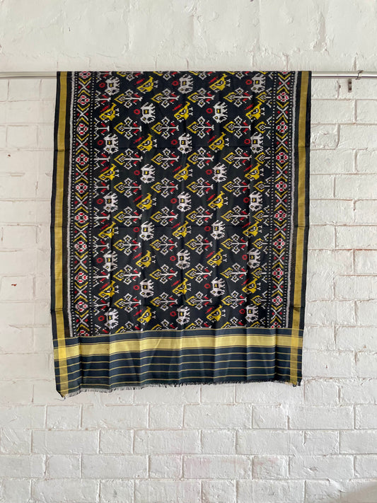 Black Patola Single Ikkat dupatta featuring intricate woven motifs and traditional artisan craftsmanship